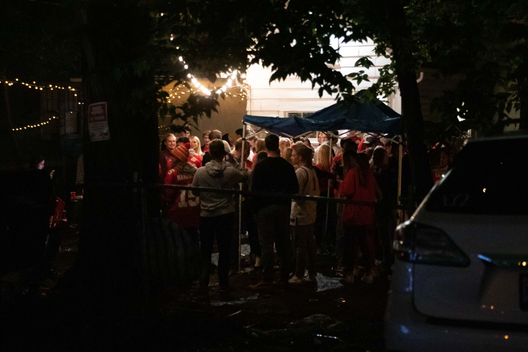 Students gather at a party off of Kentucky Street late at night